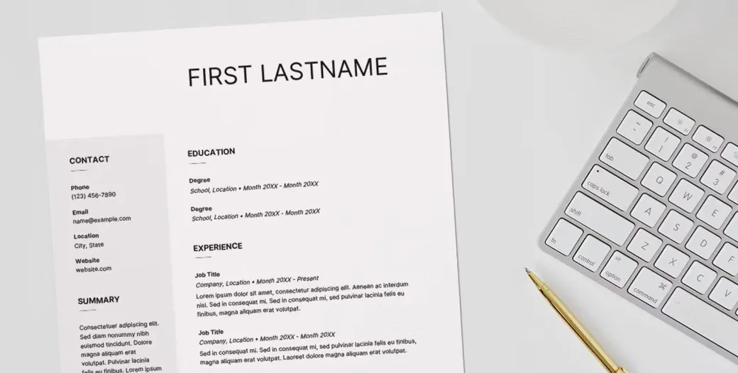 "photo of a white sheet of paper and computer keyboard"