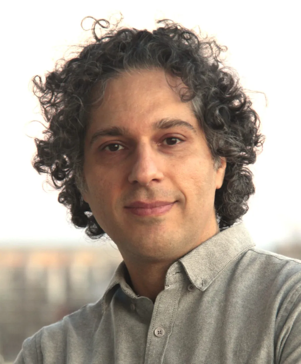 "Headshot of Ali Araghi"