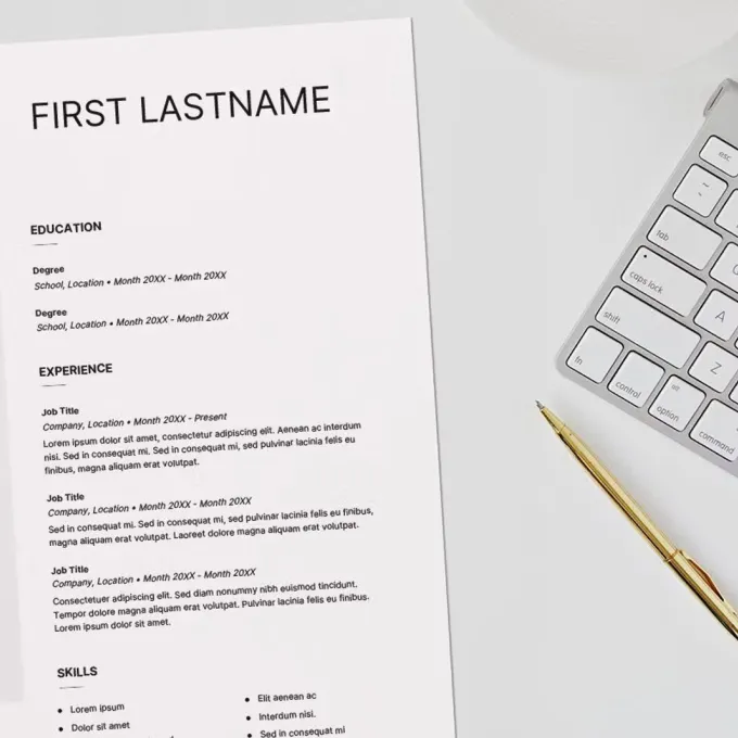 "photo of a white sheet of paper and computer keyboard"