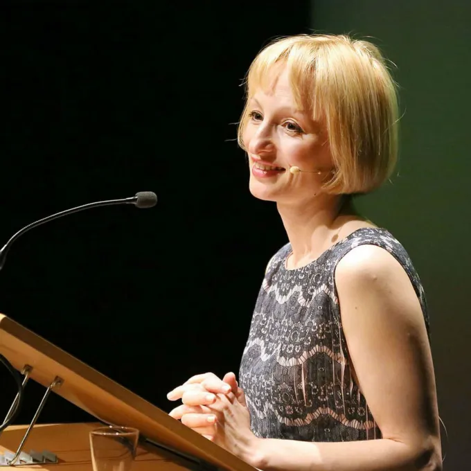 "Photo of a person with short blonde hair"